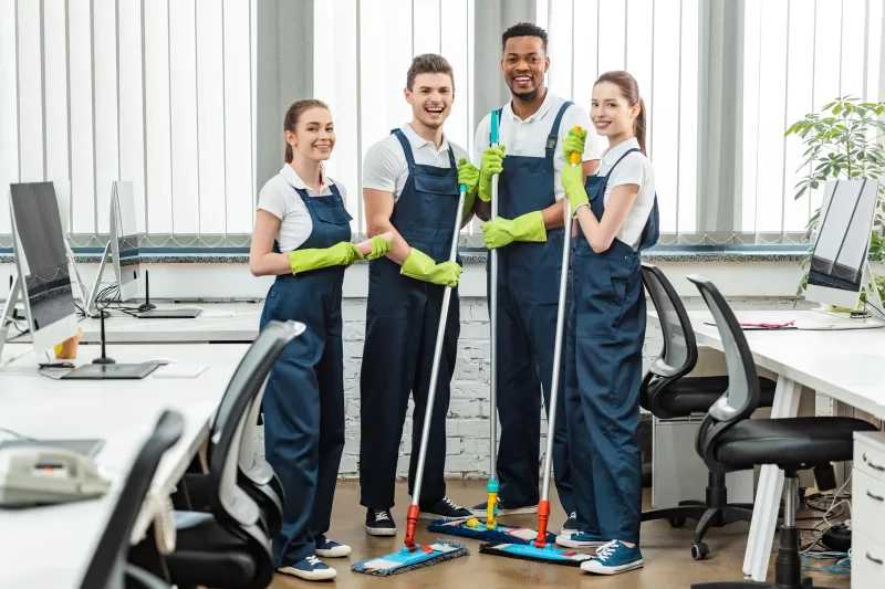 cheerful-multicultural-team-of-cleaners-looking-at-2023-11-27-04-52-21-utc-scaled
